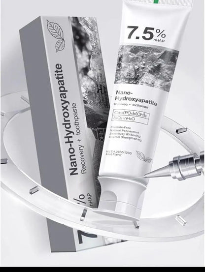 Nano-Hydroxyapatite toothpaste packaging with a syringe on a white background